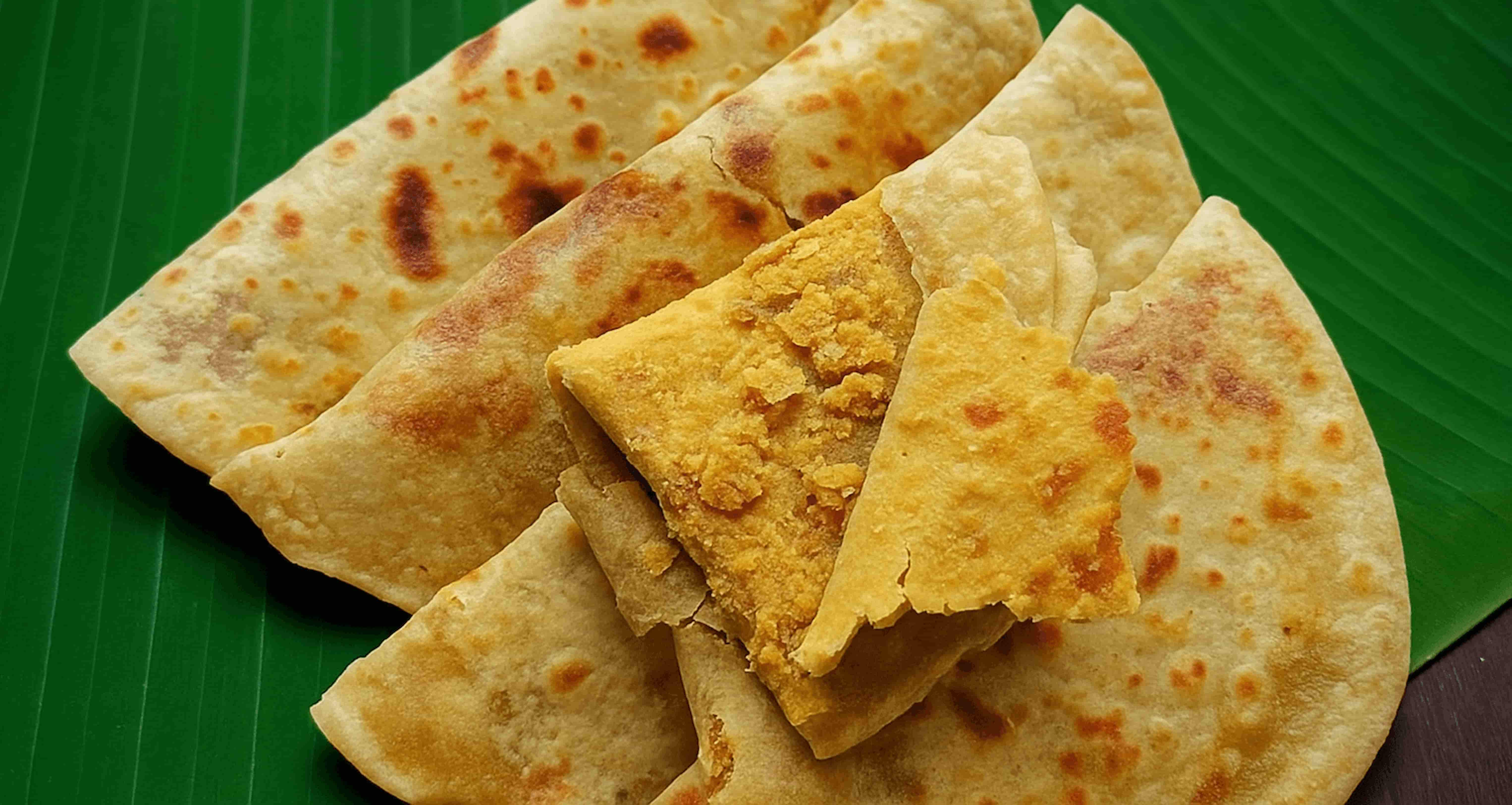 Authentic Puran Poli with Desi Ghee on Banana Leaf for Festive Meals